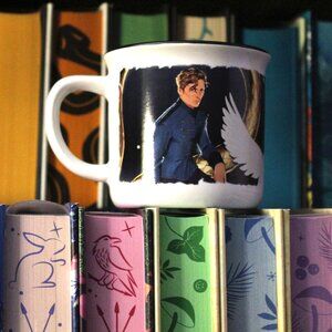 Exclusive ceramic mug inspired by the novel Serpent & Dove by Shelby Mahurin.